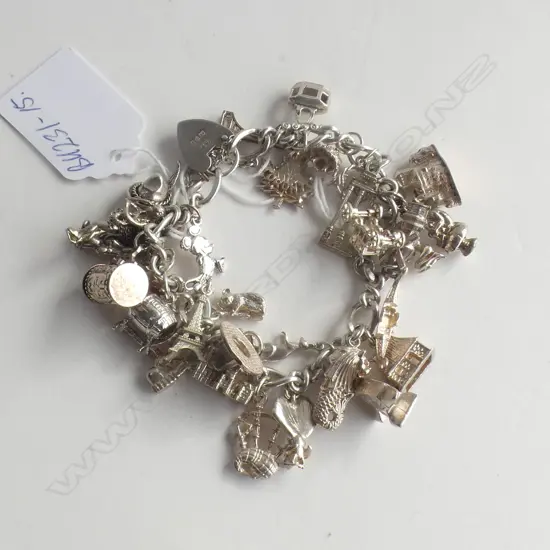 SILVER CHARM BRACELET MULTIPLE WORLD CHARMS 