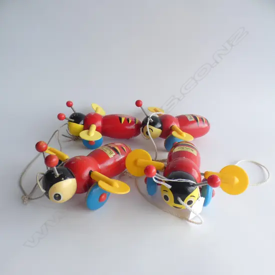 4 WOODEN BUZZY BEE TOYS