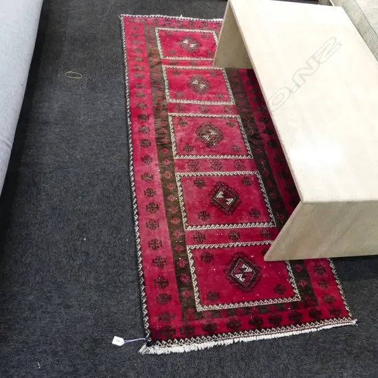 RED HAND WOVEN WOOLEN RUG