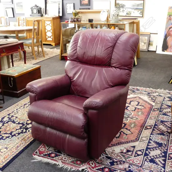 NATUZZI MAROON LEATHER LAZYBOY