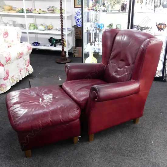 NATUZZI LEATHER CHAIR & OTTOMAN