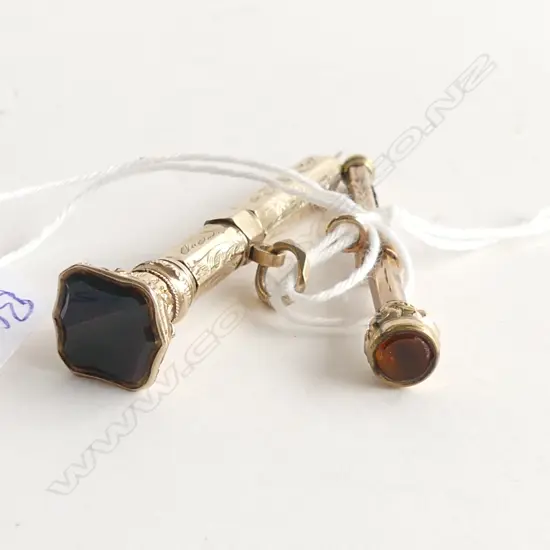 2 x c1900 GILT ENGRAVED PROPELLING PICKS. STONE SET