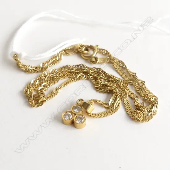 18CT GOLD & 3 DIAMOND PENDANT. ON G/PLATE ? CHAIN