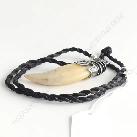 SILVER MOUNTED BEARS TOOTH PENDANT