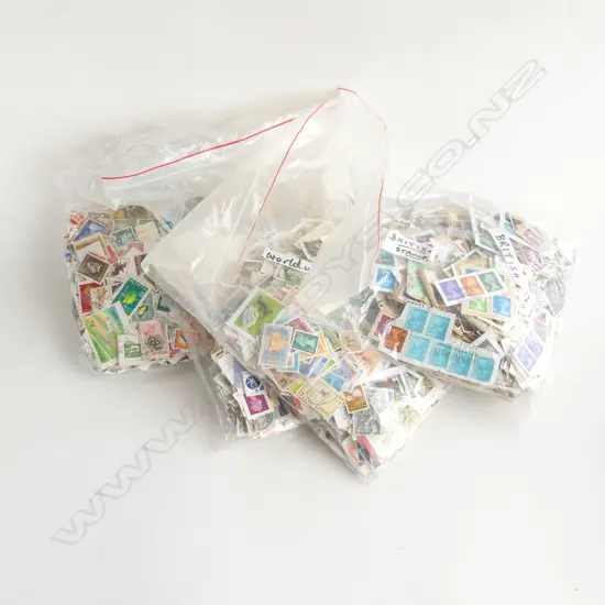 4 BAGS ASST. WORLD STAMPS