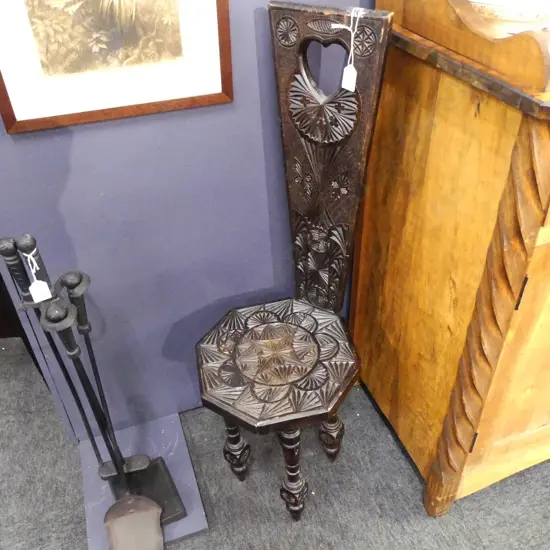 CARVED SPINNING CHAIR  