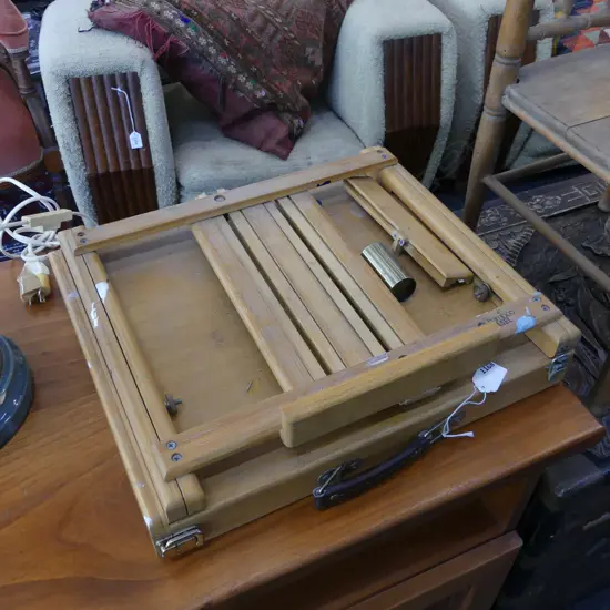 PORTABLE ARTIST EASEL WITH SLIDING PAINT STORAGE - INCLUDES CONTENTS PAINTS ETC..