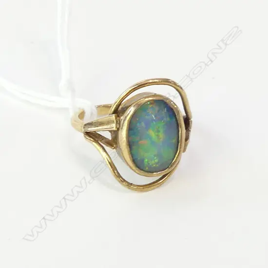 9CT GOLD RING OPAL DOUBLET PANEL SCROLLING FRAME 3.84gms