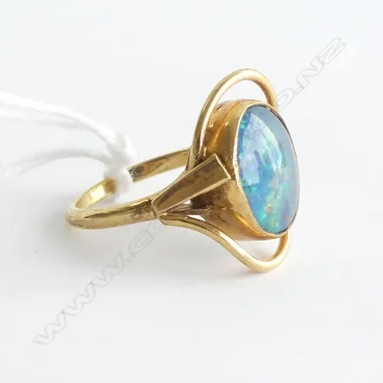 9CT GOLD RING OPAL DOUBLET PANEL SCROLLING FRAME 3.56gms