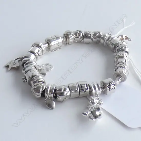 PANDORA TYPE SILVER BRACELET WITH MULTIPLE BEADS