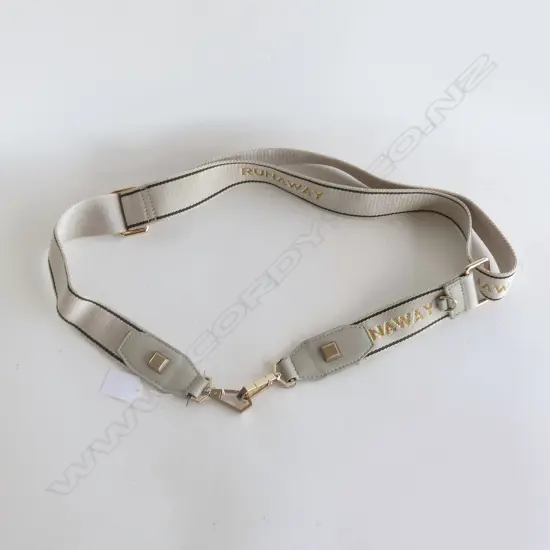 KAREN WALKER RUNAWAY STRAP/BELT?