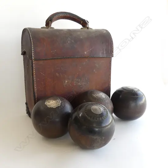 LEATHER CASED SET OF 4 LIGNUM VITAE BOWLS WITH SILVER PLAQUES