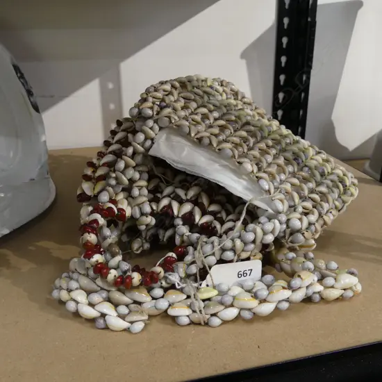 THREE COWRIE SHELL BAGS TONGA