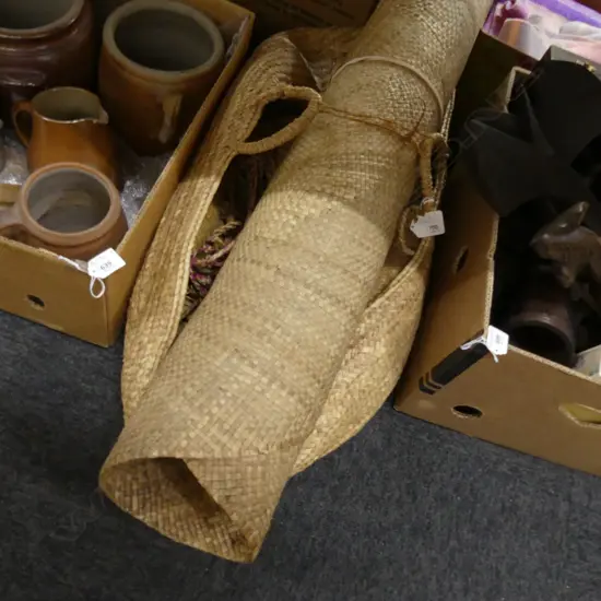 WOVEN PACIFIC MATS AND BASKETS.