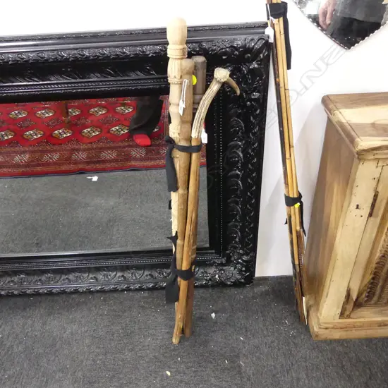 4 CARVED WOODEN WALKING STICKS; 1 w. STAG HORN HANDLE L.980mm