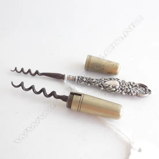 PR OLD CORK SCREWS; 1 STG SILVER HANDLE & 1 ENCASED BRASS