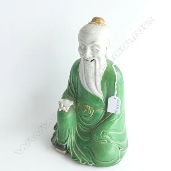 ORIENTAL POCELAIN SEATED DEITY WITH OIL LAMP ? H.288MM.