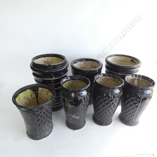 8 BLACK CERAMIC PLANT POTS; H.320mm