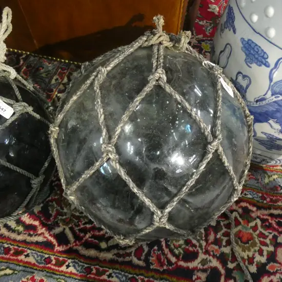 OLD GLASS LARGE FISHING FLOAT WITH BLACK NETTING 360mm dia