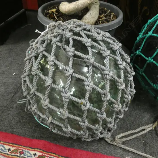 OLD GLASS LARGE FISHING FLOAT WITH GREY NETTING 330mm dia
