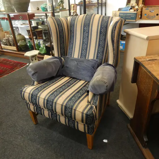 UPHOLSTERED WING BACK CHAIR
