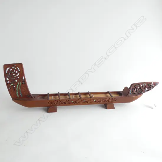 ROTORUA CARVED MAORI WAKA w. PAUA INSETS L.530mm