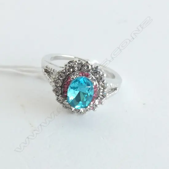 SILVER MULTI GEM SET CLUSTER RING LGE BLUE CENTRAL STONE