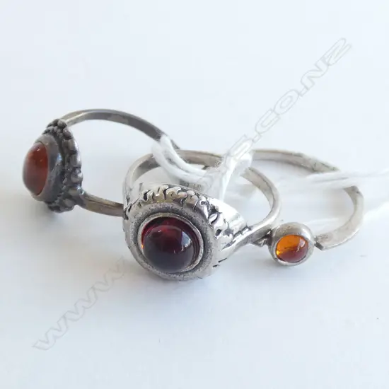 3 SILVER & AMBER RINGS