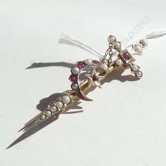 EDWARDIAN 9CT GOLD PEARL/RUBY? SWORD BROOCH