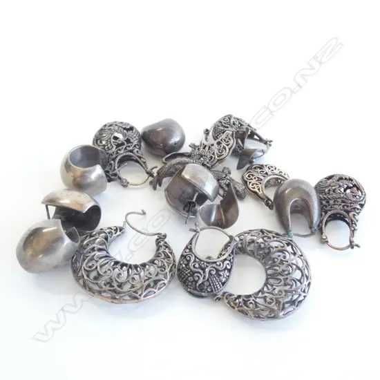 NINE PAIRS OF SILVER EARRINGS