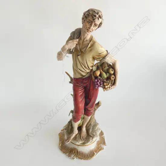 A CAPODIMONTE FIGURE OF A YOUNG MAN H 420 MM