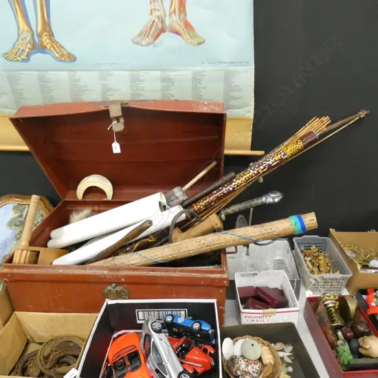 RED PAINTED METAL TRUNK + ASST. COSTUME WEAPONS ETC