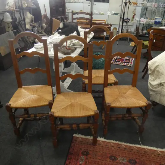 FOUR RUSH SEAT LADDER BACK CHAIRS