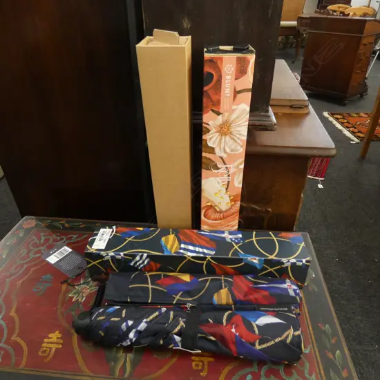 2 DESIGNER BLUNT METRO UMBRELLAS...