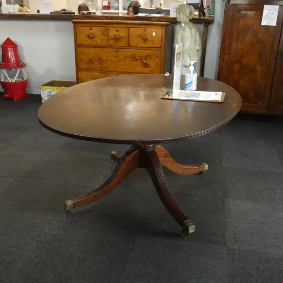 REGENCY STYLE OVAL MAHOGANY DINING TABLE...