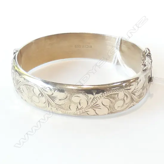 GOLD OVER SILVER HINGED BANGLE