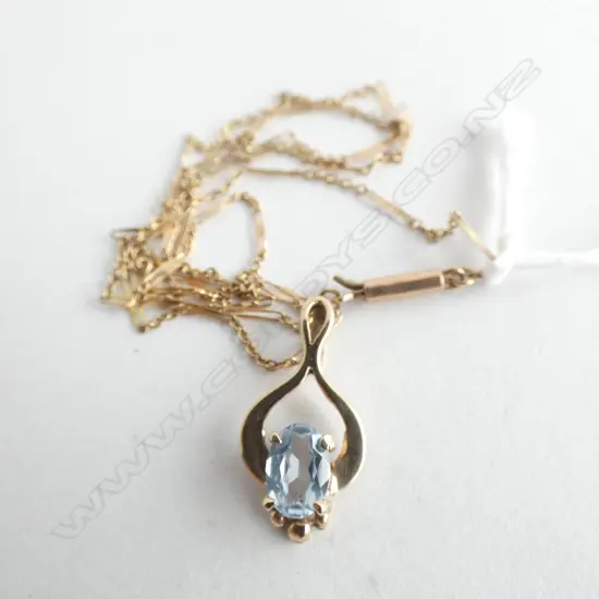 9CT GOLD & AQUAMARINE? PENDANT AND CHAIN  2.60gm