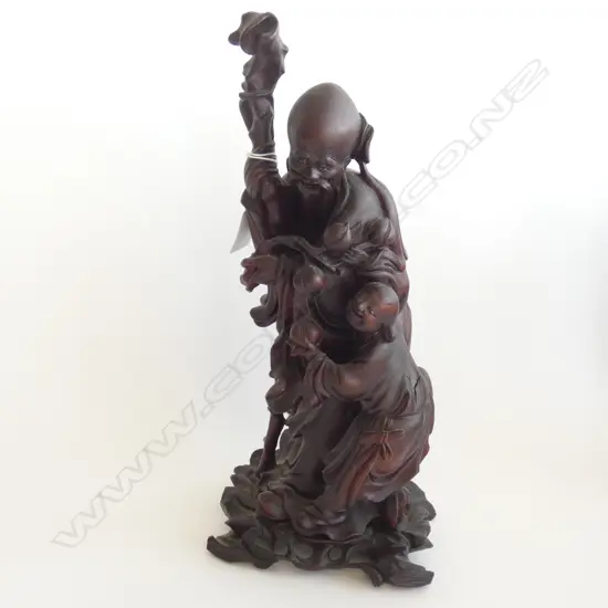 CARVED WOODEN ORIENTAL FIGURE H. 335MM
