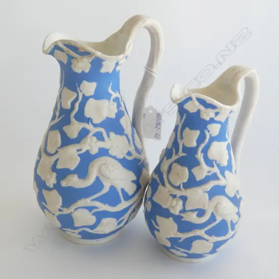 PR GRADUATED BLUE & WHITE ANTIQUE JUGS - PARIAN RELIEF BIRDS & FOLIAGE  LARGEST H. 220MM
