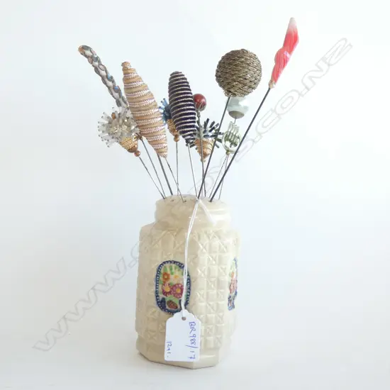 12 VINTAGE HAT PINS IN HOLDER