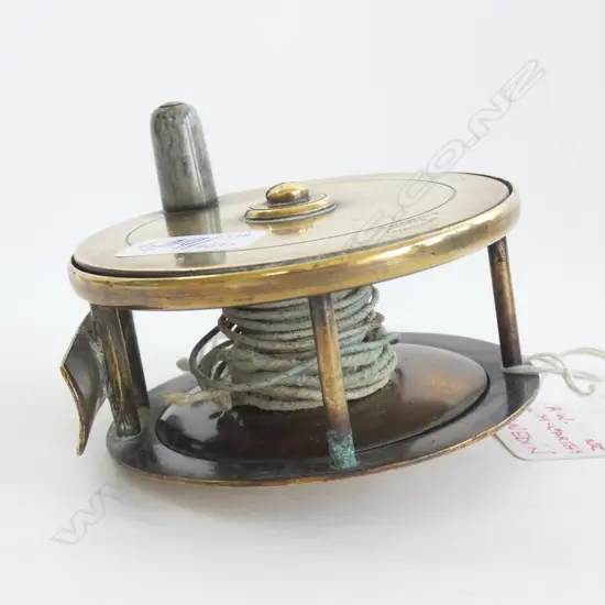 (16169) A & W MCCARTHY DUNEDIN OLD BRASS ENCASED FISHING REEL - DIA  80MM