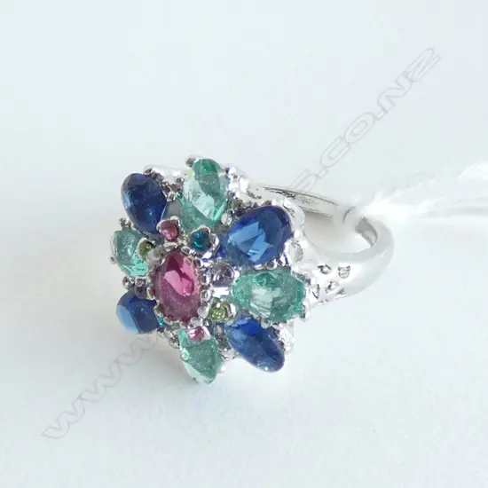 NOTE; The stones appeared to be glued into settings