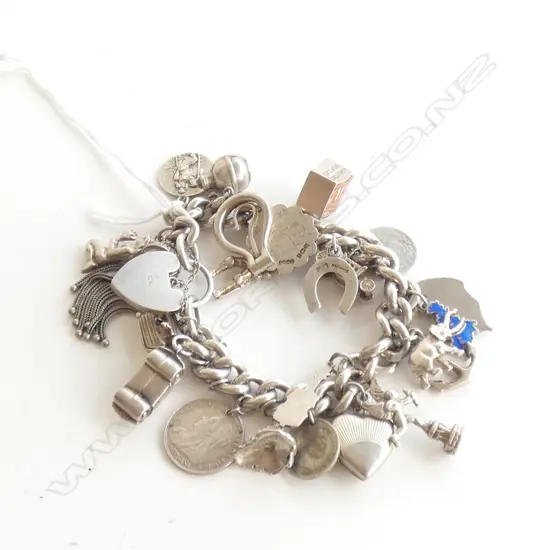 (20141) SILVER VINTAGE CHARM BRACELET INCLS. TASSLE