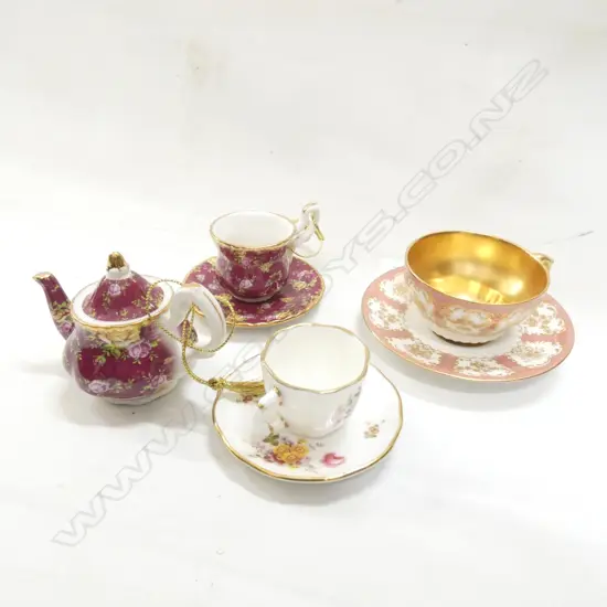 2 MINIATURE CUPS & SAUCERS; ROYAL DOULTON GOLD GILD / CROWN DERBY POSIES & ROYAL ALBERT RUBY LACE MINIATURE C&S & TEAPOT