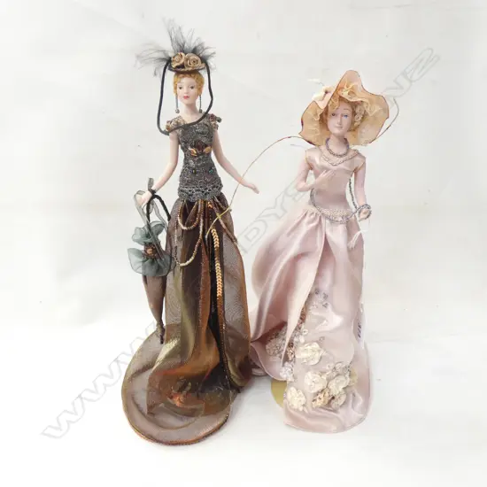 PR SM PORCELAIN COSTUMED LADIES ON STANDS H. 310MM