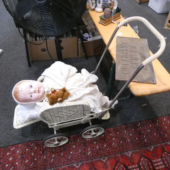 CANE PRAM WITH VINTAGE DOLL