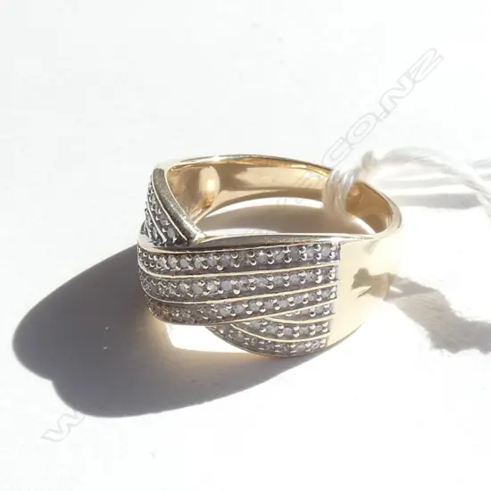 9CT GOLD AND DIAMOND CROSS OVER BAND (VALUATION)
