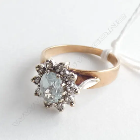 9CT GOLD AQUAMARINE AND DIAMOND RING