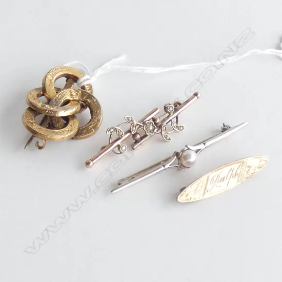 FOUR GOLD AND SILVER BROOCHES