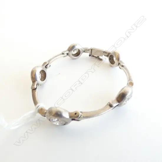 STG SILVER BRACELET w. CZs 23.5 GRAMS 